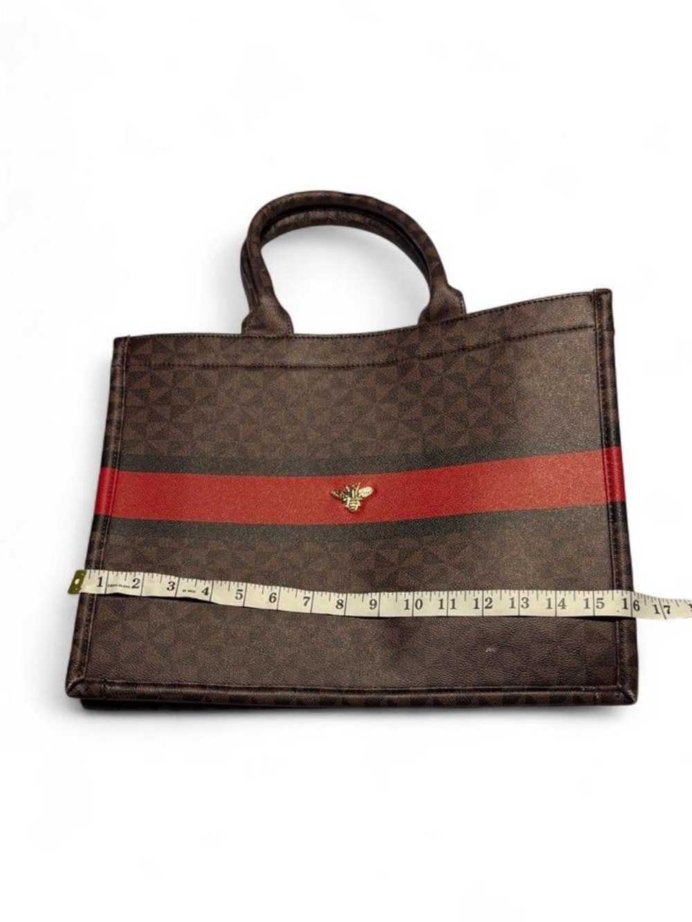 Structured Brown Tote with Red Accent Stripe and Gold Bee Detail